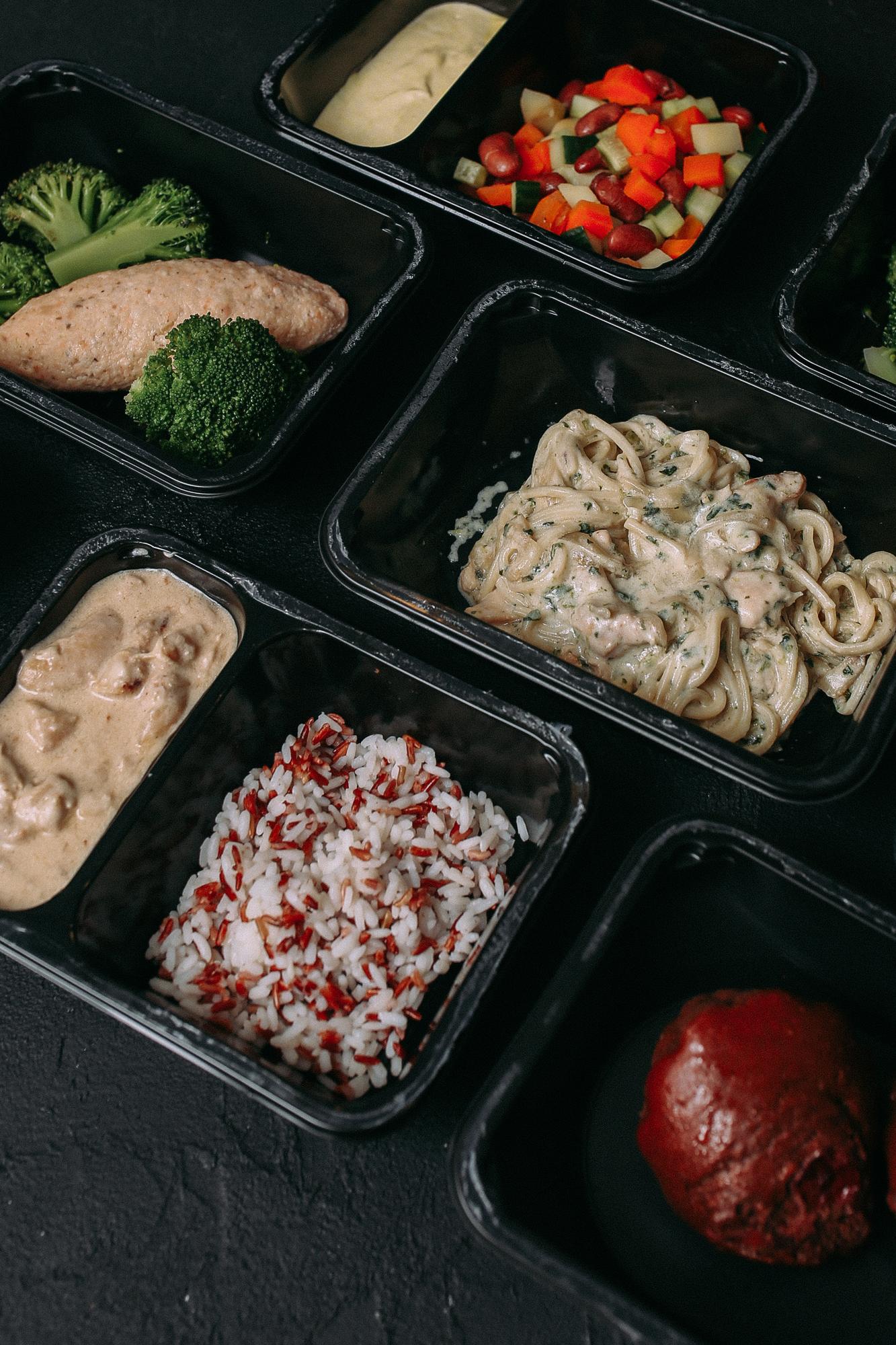 Stack of one-time meal boxes on counter